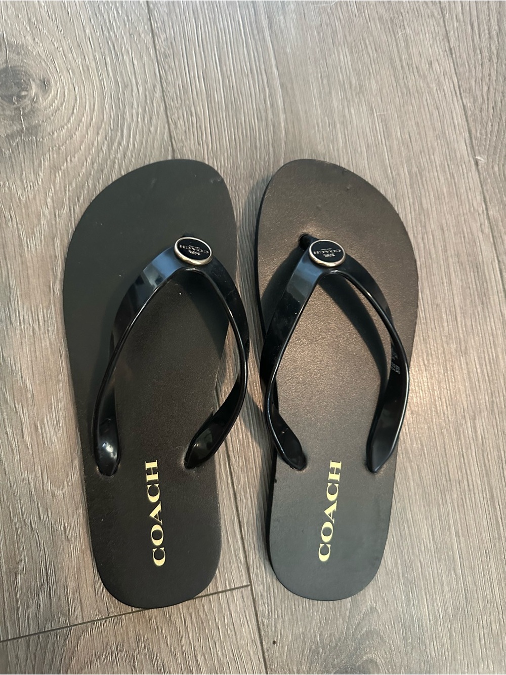 Coach flip flops